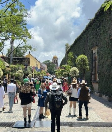Tourists on a sunny walk in Tequila, Jalisco, during the Jose Cuervo Express Premium Plus.