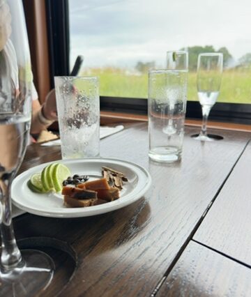 Tequila cocktails and snacks served by the window on the Jose Cuervo Express Premium Plus train.