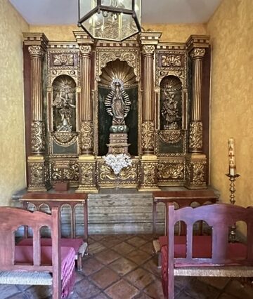 Ornate chapel interior at La Rojeña Distillery, visited during the Jose Cuervo Express Premium Plus in Tequila, Mexico.