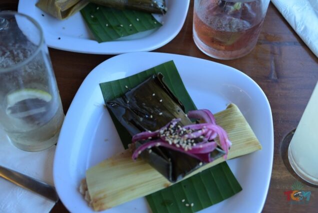 Plate with tamal wrapped in banana leaf aboard the Jose Cuervo Express Train