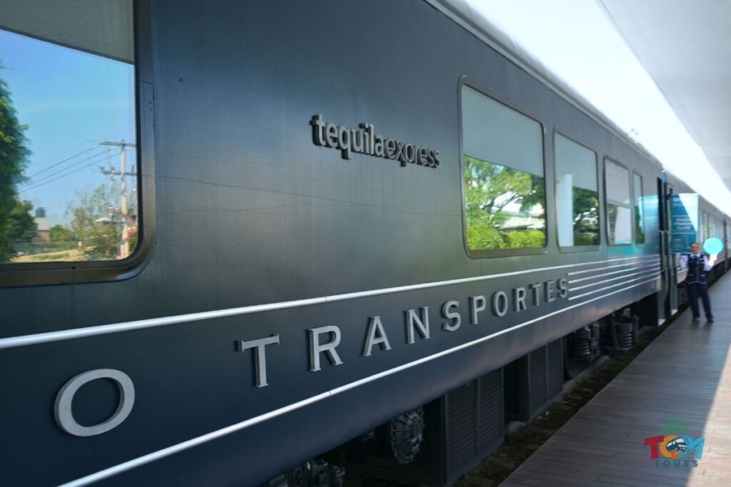 Exterior view of the Tequila Express Train, showcasing the sleek black train cars used for the tequila train journey to Tequila, Jalisco.