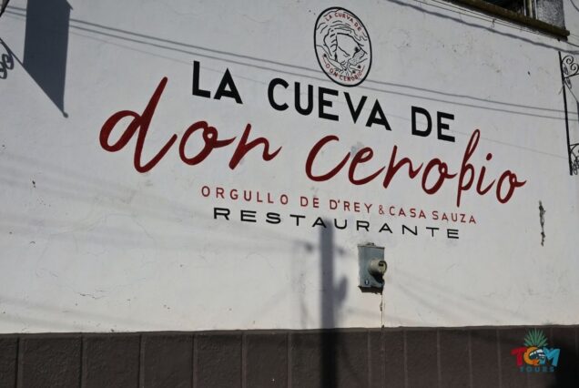 Sign for La Cueva de Don Cenobio restaurant, a Casa Sauza landmark on the Tequila Express Train route.