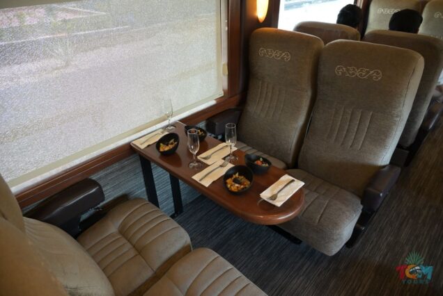Table set with drinks and appetizers inside the Jose Cuervo Express Train