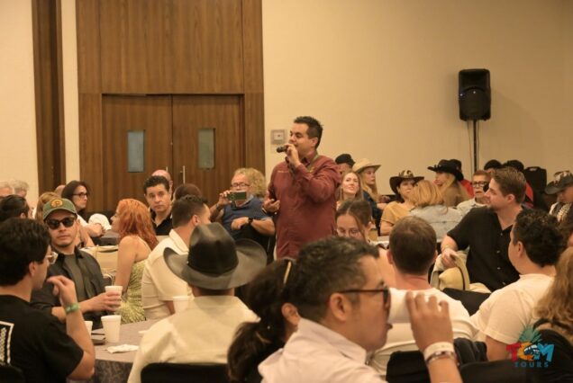 Guide speaking during the Tequila Express Train orientation session, addressing guests before boarding the tequila train.