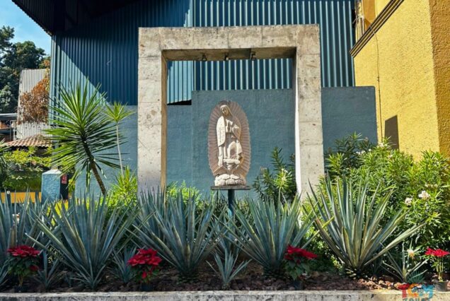 Orendain Tequila Distillery Tour featuring agave plants and garden statue at the Orendain distillery in Jalisco