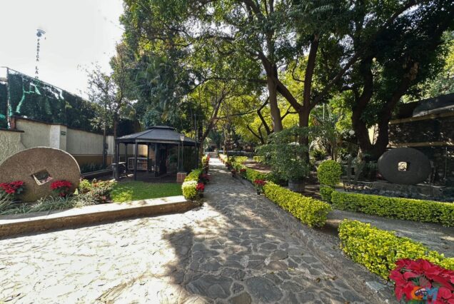 Orendain Tequila Distillery Tour walking path through the gardens at the Orendain distillery in Jalisco
