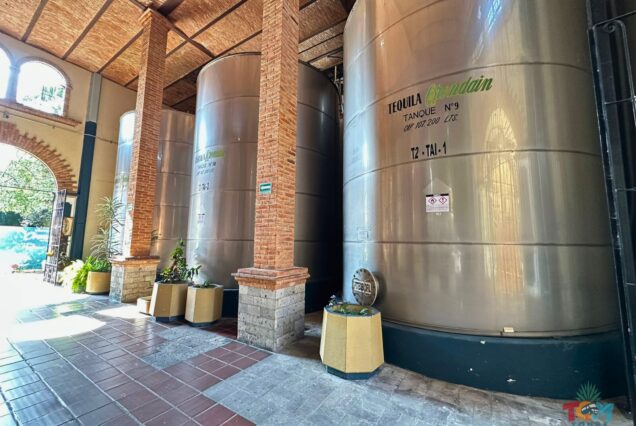 Orendain Tequila Distillery Tour showcasing stainless steel fermentation tanks inside the Orendain distillery in Jalisco